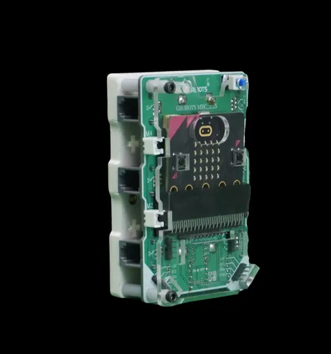 Ultima controller in a clear case, with an LED grid, buttons and a small display